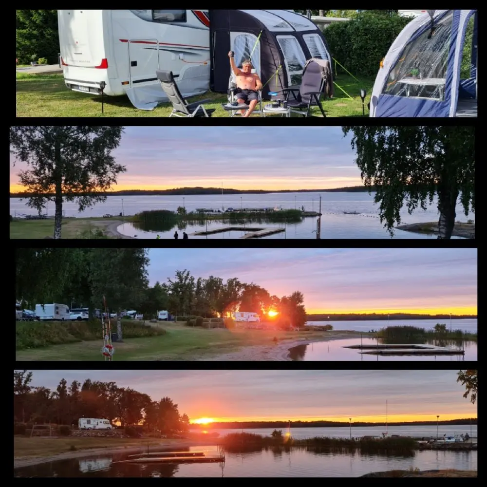 En kvällsbild på Hargshamns camping med en sportutility vehicle och kompakt MPV parkerade, omgivna av ett mjukt sken från solnedgången eller soluppgången i bakgrunden.