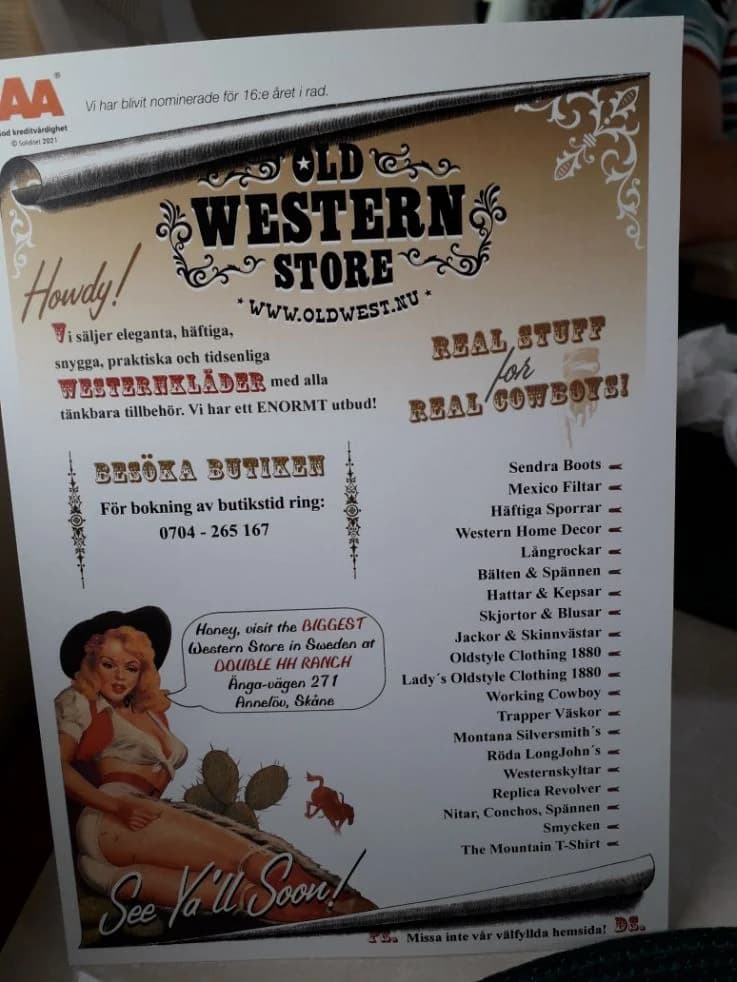 En reklamaffisch för Ställplats Wild West, designad som en banner, med text och grafik som framhäver platsens vilda västern-tema.